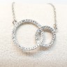 Kilkenny sterling silver Loops pendant with clear coloured cubic zirconia stones.